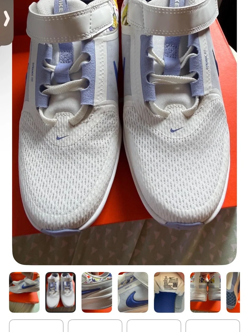 Nike White Kids Sneakers with Blue Swoosh and Multicolor Collar